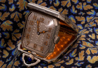 Elgin Art Deco Travel Clock/Pendant - Faceted Rectangular Case - Gilt Perlage Interior – Blue Cabochon Release - Early 1930s