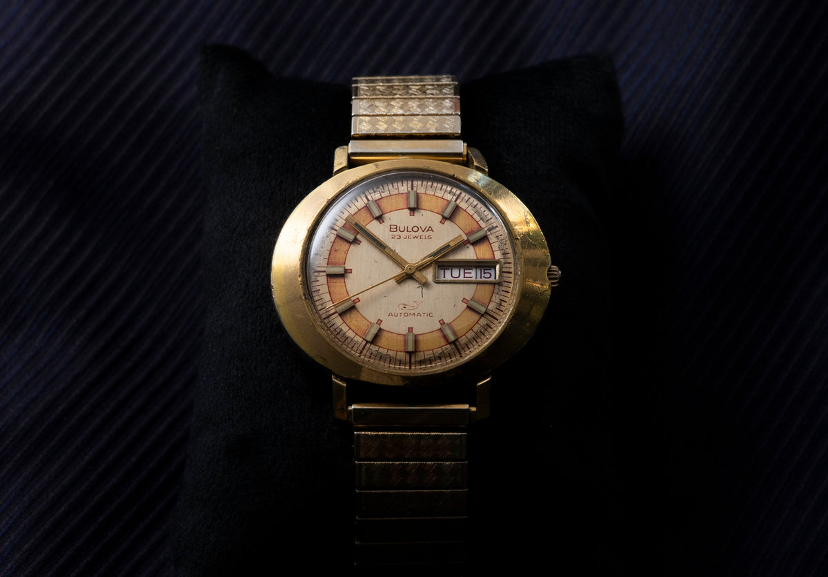 Bulova President - 23 Jewel Automatic - Day-Date - Peach and Champagne Dial - Circa 1972