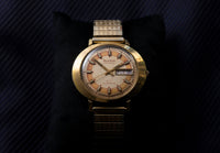 Bulova President - 23 Jewel Automatic - Day-Date - Peach and Champagne Dial - Circa 1972