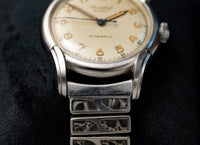 Cortebert Sport Automatic Bumper - Patina Cream Dial - Stainless Steel - Circa Late 1940s to Early 1950s