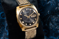 Seiko Automatic 7006-7119 - Gold Tone Day-Date - Charcoal Dial - 1972